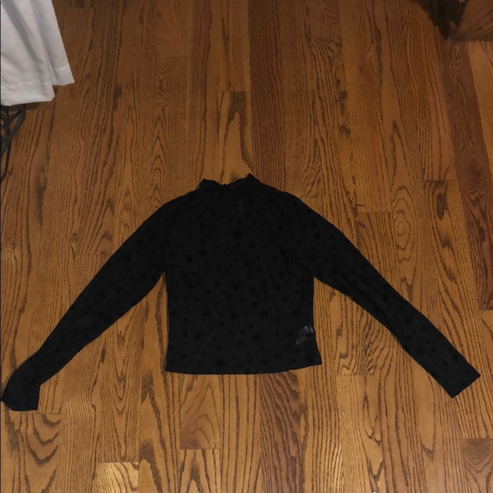 black see through star design mock neck top